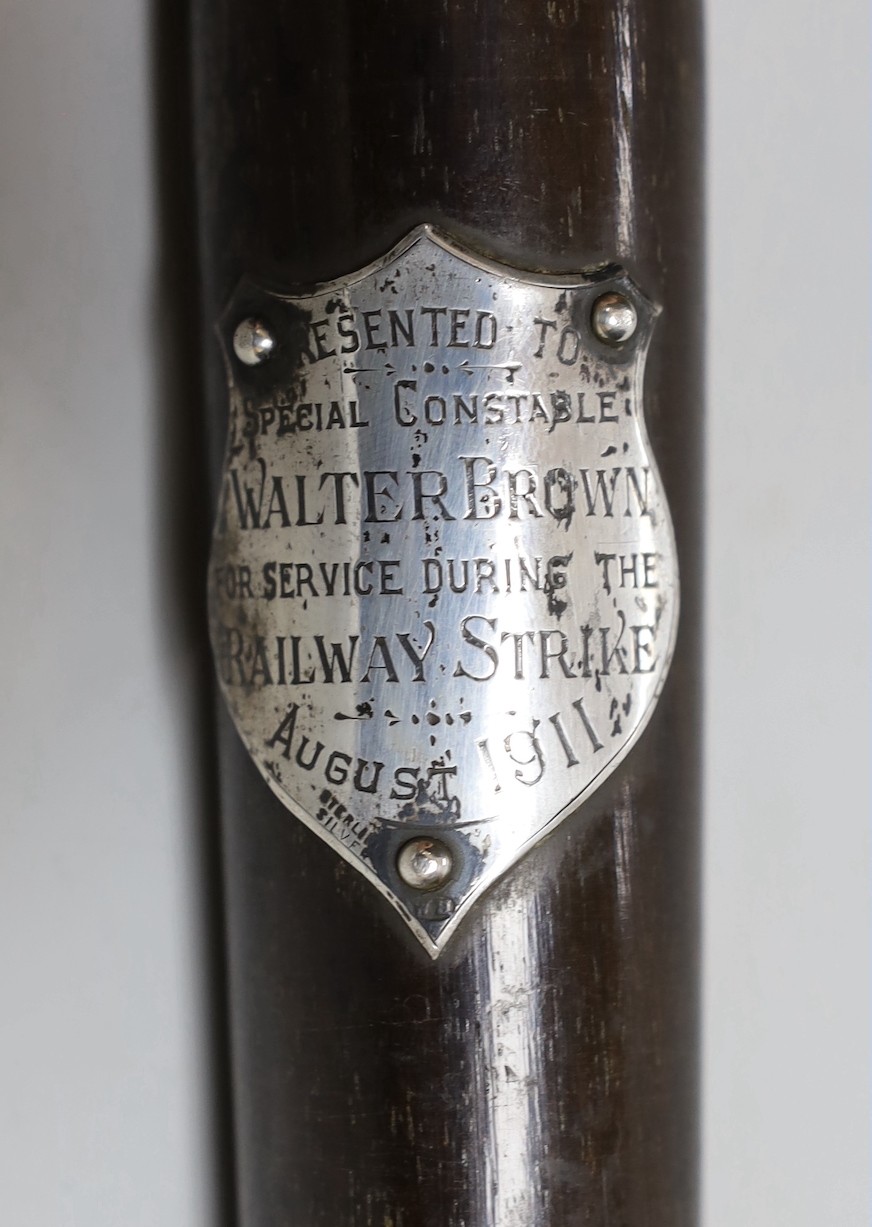 A George V sterling mounted hardwood truncheon with engraved dedication 'Presented to Special Constable Walter Brown for service during the Railway Strike 1911'